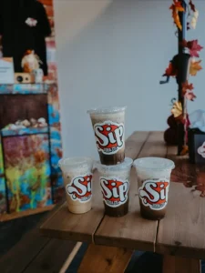 Comparison of dirty soda and regular soda showing differences in ingredients, texture, and customization