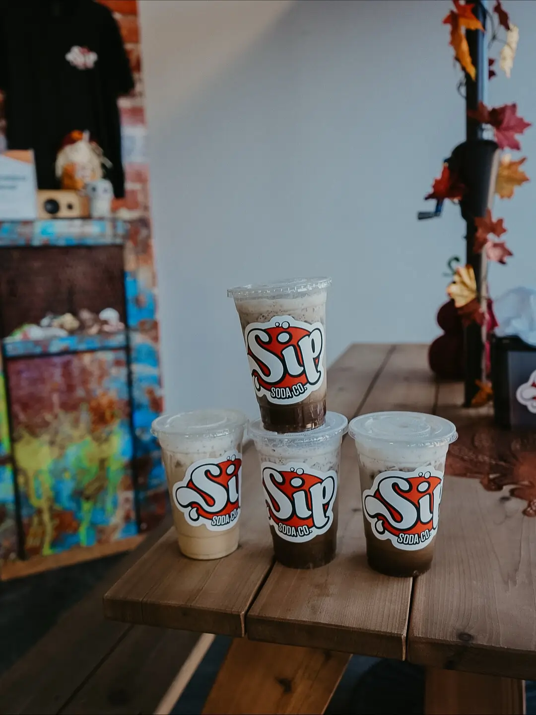 Comparison of dirty soda and regular soda showing differences in ingredients, texture, and customization