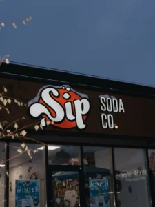 visual timeline showing the evolution of soda from classic cola to modern dirty soda drinks