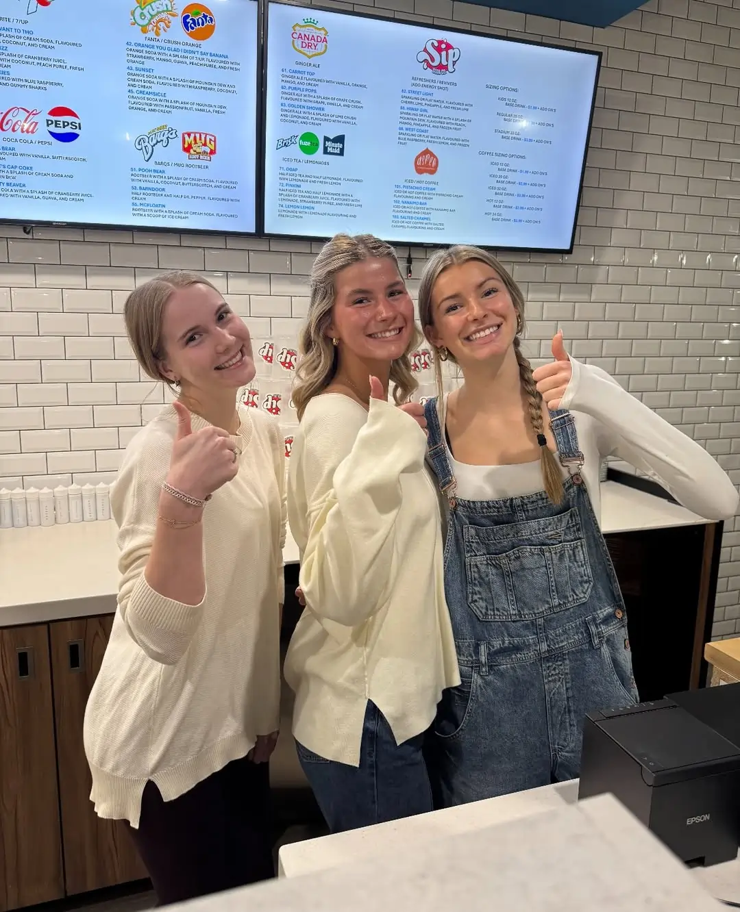Customers enjoying dirty soda drinks inside a Canadian café during winter