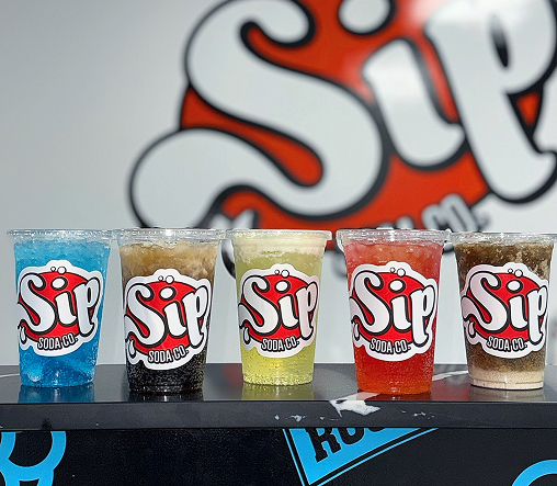 Assorted dirty sodas displayed in a row