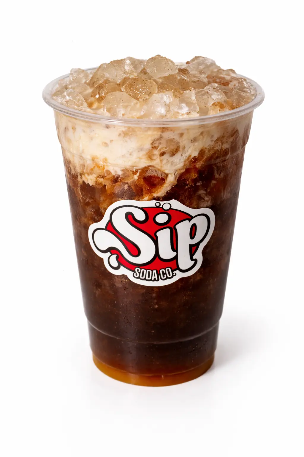 Brown dirty soda in Sip Soda cup with creamy mix-in and nugget ice